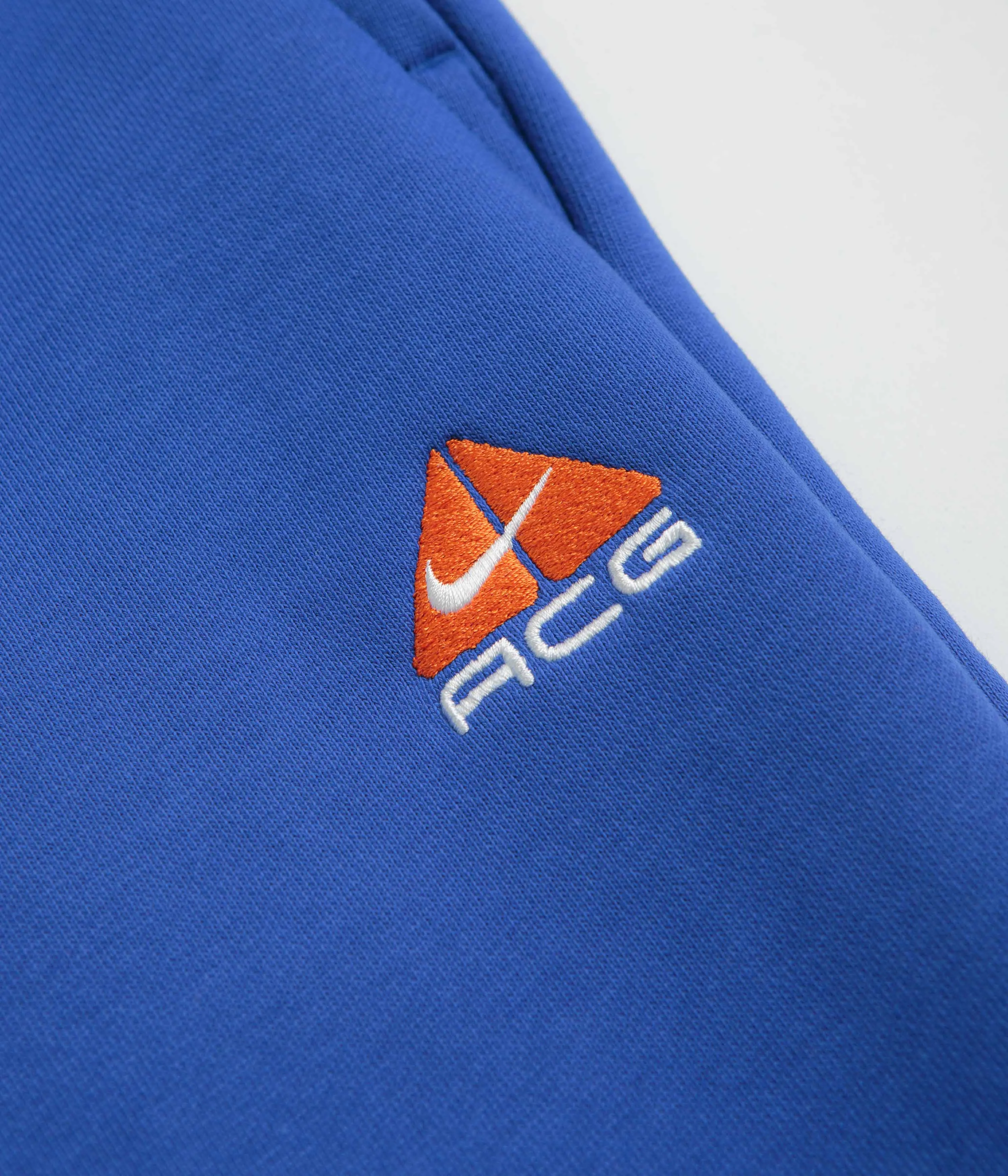 Nike ACG Tuff Fleece Lungs Pants - Game Royal / Safety Orange / Summit White Nike ACG Outdoor Clothing