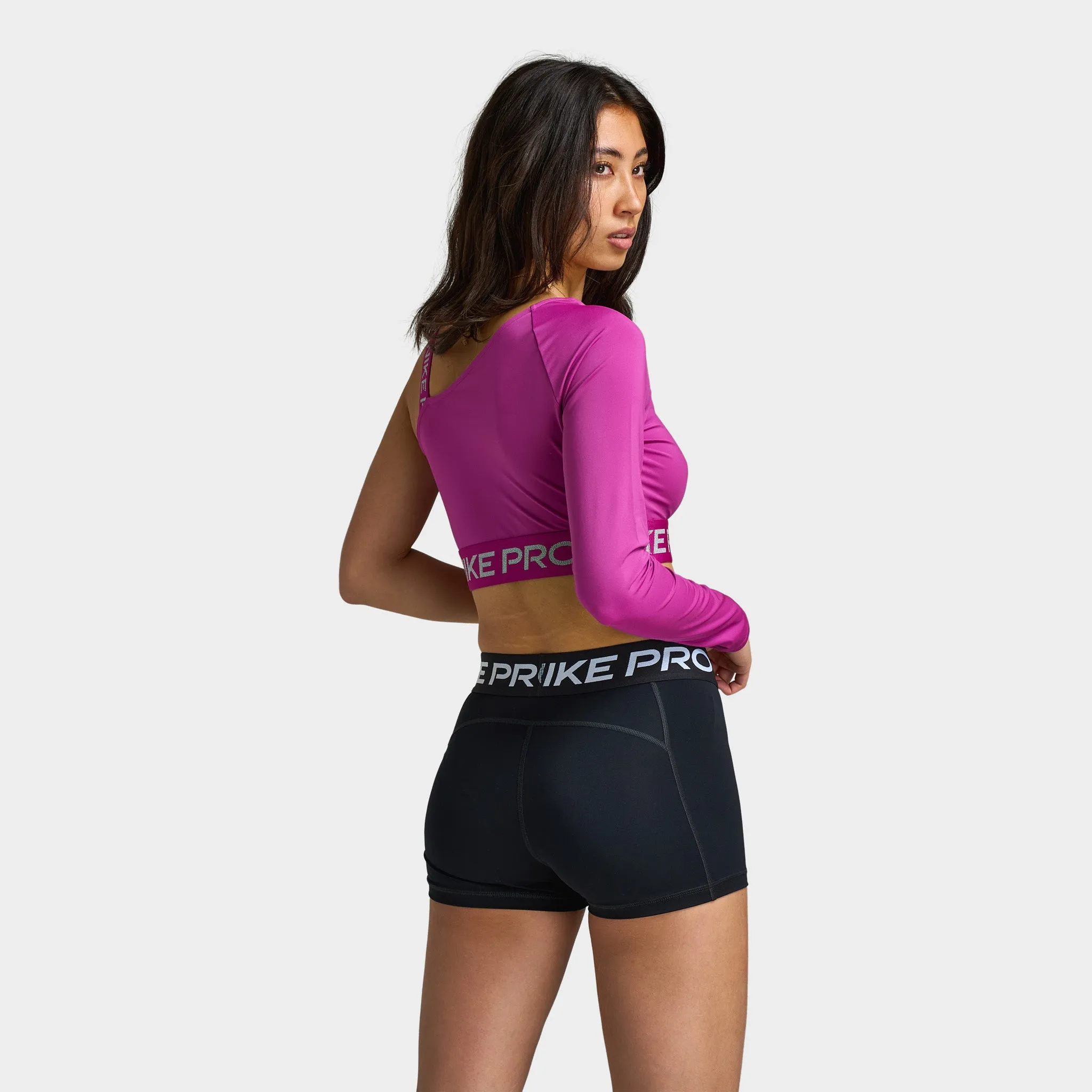 Womens Nike Nike Pro Shine Women's Dri-FIT Asymmetrical Cropped Top / Pink